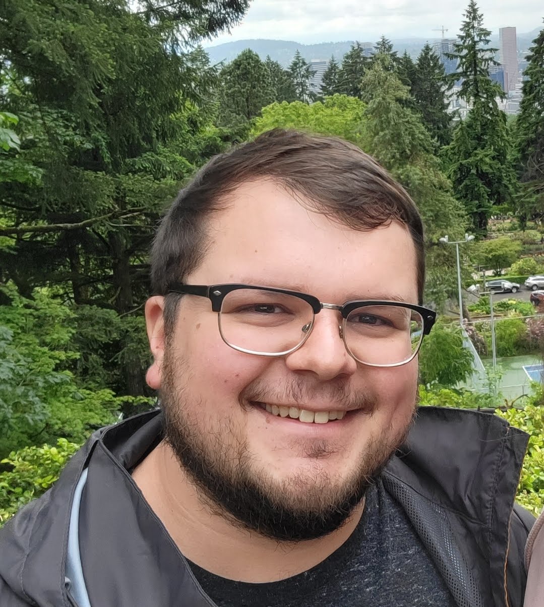 Headshot of Adam Quinn